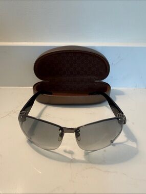 Gucci Silver Rimless Sunglasses with Gray Gradient Lenses